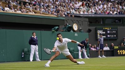 Novak Djokovic plays at Wimbledon with the number ''23'' printed on his white tennis shoes