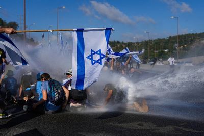 Israelis block highways in nationwide protests over government's plan to overhaul judiciary