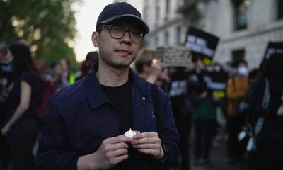 Police in Hong Kong raid family home of UK-based exile Nathan Law