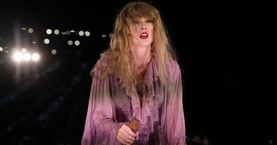 Taylor Swift forced to take cover as fans throw objects at her while exiting stage