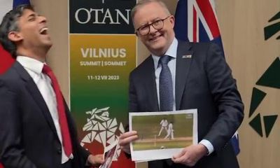 Australian PM hands Sunak picture of Bairstow stumping at Nato meeting