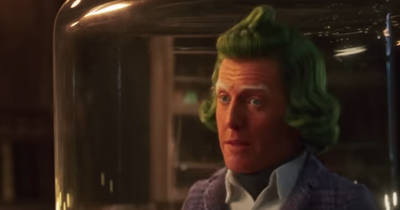 Hugh Grant unveiled as green-haired Oompa Loompa as new Wonka film trailer lands