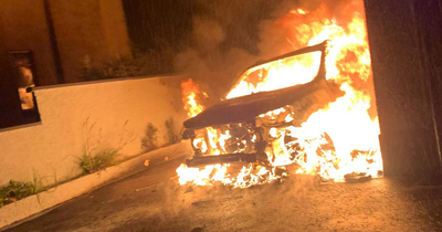 Police probe burning of nurse's car as sectarian hate crime as she describes 'terrifying situation'