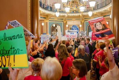 Iowa's new abortion ban is challenged in court, a day after it was passed by GOP lawmakers
