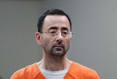 Suspect in Larry Nassar stabbing said ex-doctor made lewd remark watching Wimbledon, AP source says