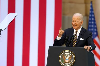Biden hails ‘unbroken’ Ukrainian people in Nato speech to spirited crowd of 10,000 - and one Trump fan