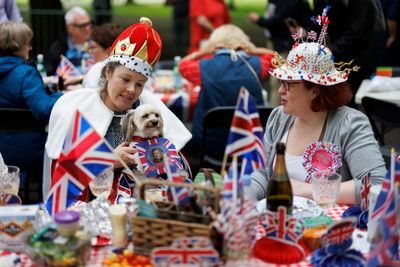 UK economy shrinks slightly after coronation bank holiday
