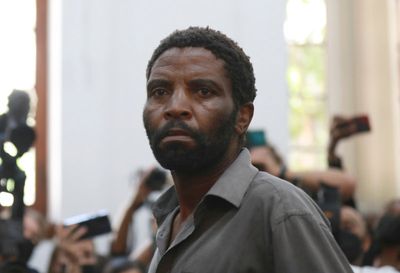Man accused of terrorism over fire at South African Parliament says he "burned it intentionally"