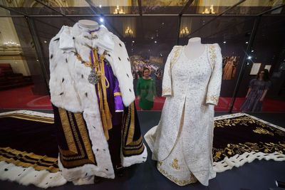 King and Queen enjoy sneak preview of coronation display before Palace opens to public