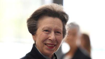 Princess Anne looks chic in pearly white textured blazer and dark teal dress