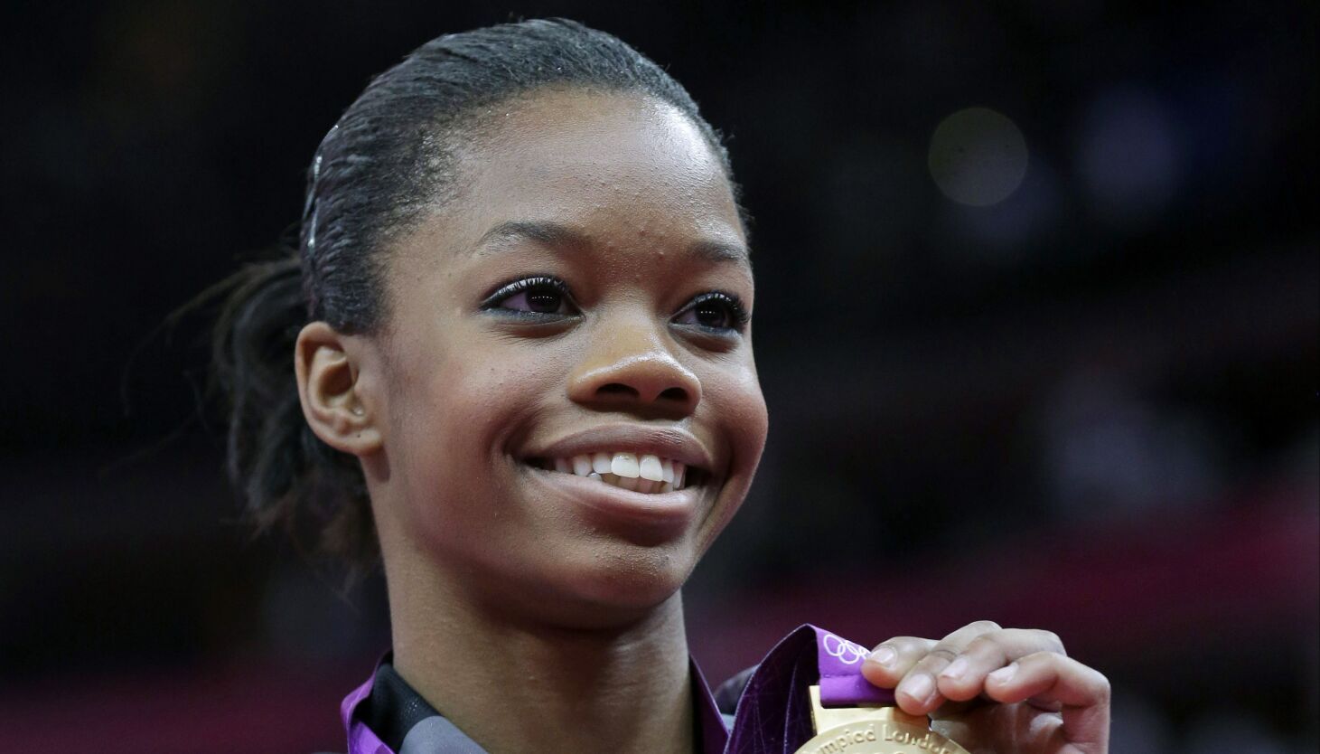 Olympic goldmedal gymnast Gabby Douglas looks to…