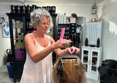 Michigan city investigates salon owner's online comments about gender identity