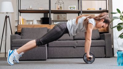 How to do the ab wheel plank — and the benefits for building your core