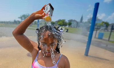 ‘So drained and so exhausted’: readers on severe heat and floods in the US