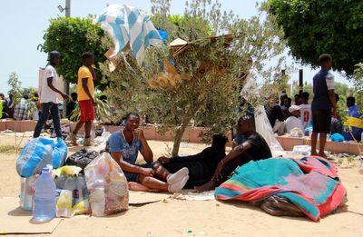 At least 15 migrants died this week off Tunisia's coast and at a desert border amid tensions