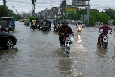 Rescuers evacuate 14,000 people from flood-hit villages in eastern Pakistan