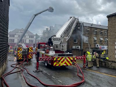 Major incident as fire rips through takeaway and baby treated by paramedics