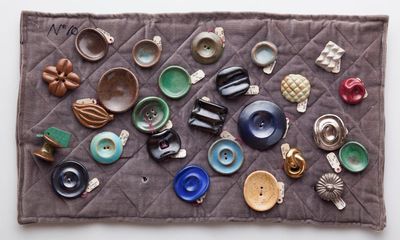 The humble button goes from mere fastener to a place on the gallery wall