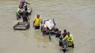 Sleeping under tarpaulin, uncertainty over food and defecating in open - how flood-hit slum dwellers are surviving in Delhi