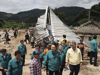 South Korea's death toll from rainstorms grows as workers search for survivors