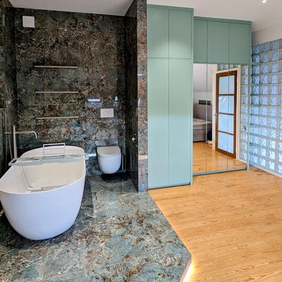This attic conversion was inspired by a luxury hotel – and the freestanding bath is the star of the show