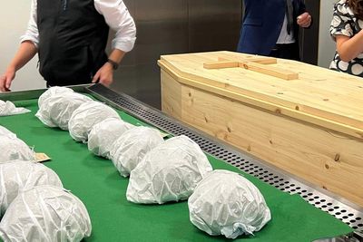 Reburial ceremony held as 400-year-old human skulls returned to Irish island