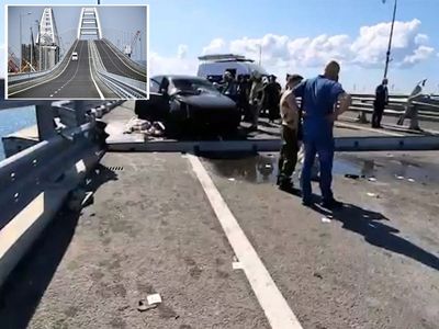 Ukraine war - live: ‘Drone attack’ on Crimea bridge hits critical supply line as Putin ends grain deal