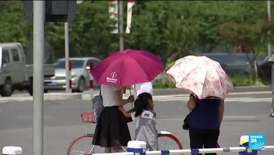 China records its hottest ever temperature as mercury hits 52.2C