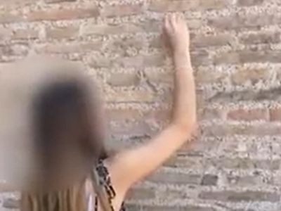 Teenage girl caught carving her name into Rome Colosseum