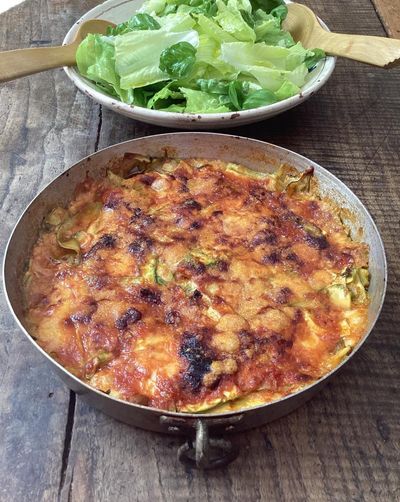 Rachel Roddy’s recipe for courgette, mozzarella and parmesan layered bake