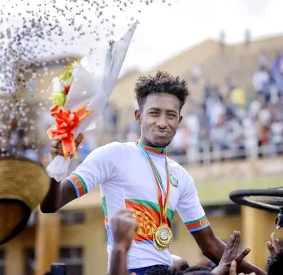 Eritrean national champ debuts at Tour de France on a single speed bike with a purpose