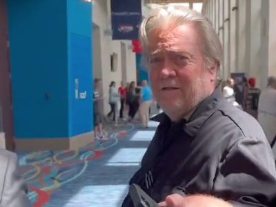 Steve Bannon confronted about ‘We Build the Wall’ fraud campaign at right-wing conference