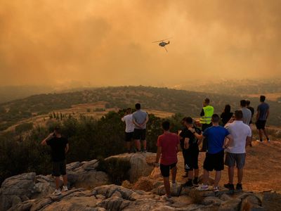 Families unable to cancel summer holidays to Spain and Greece despite extreme heat warnings and wildfires