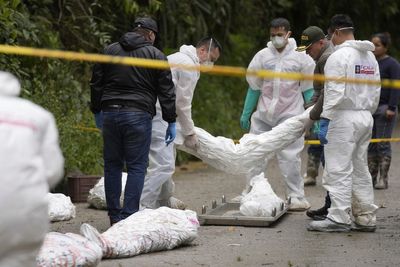 A mudslide in Colombia kills at least 14 people and blocks a crucial highway