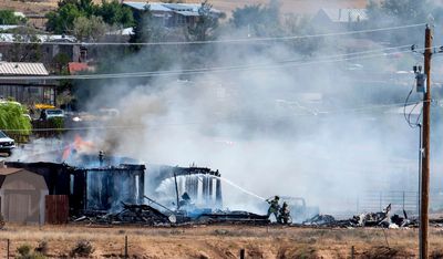 Pilot dies as small plane crashes into unoccupied home in New Mexico