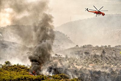 Europe heatwave live: EU sends firefighters to Greece as new evacuation orders issued