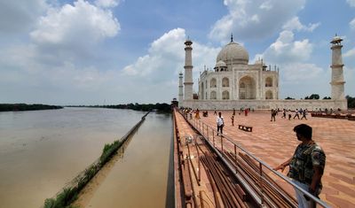 Yamuna river reaches the iconic Taj Mahal's outer walls in India after swelling with monsoon rains