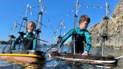 Two young brothers launch model boats to circumnavigate Antarctica
