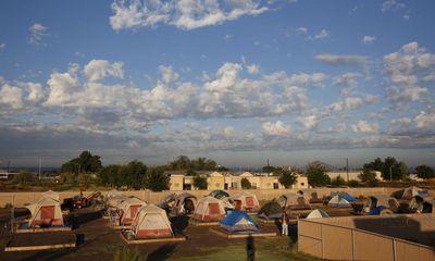 ‘Nothing feels like enough’: surviving the heat in a New Mexico homeless encampment