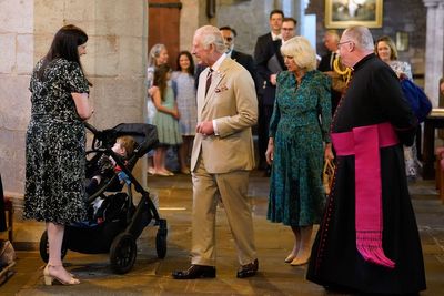 Schoolchildren welcome King and Queen on first visit to Wales since coronation