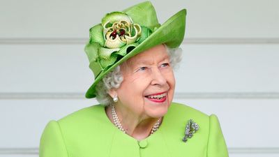 How the late Queen Elizabeth II insisted on her four dogs being 'piled' into her portrait