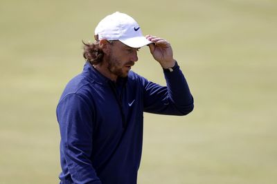 Tommy Fleetwood driven on by home support as he takes share of Open lead