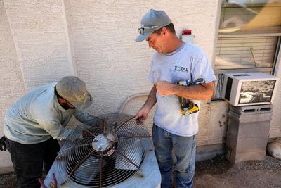 ‘A prisoner in your own home’: AC is a lifesaving but costly ordeal during heatwaves