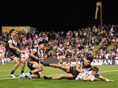 Tigers close on NRL wooden spoon with loss to Dragons