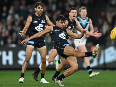 Carlton surge halts Port's record winning streak
