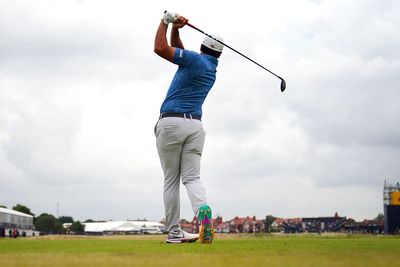 Early starters battle overcast conditions as Tommy Fleetwood shares Open lead