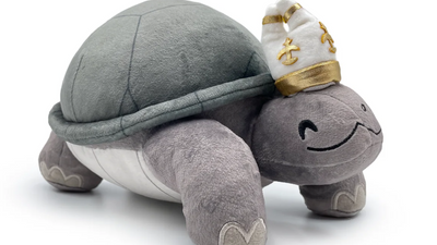 The turtle pope from Elden Ring is now a plushie, and I've never felt an urge to pet so strong