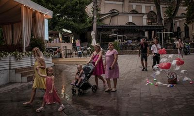 ‘We try to keep a good mood’: escapism alive in Odesa’s resorts despite Russian onslaught