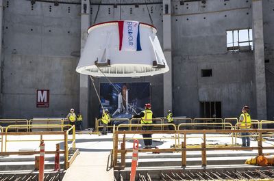'Go for Stack': 1st parts of space shuttle Endeavour vertical display lifted into place at California Science Center