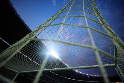 Football match abandoned after hearse driven on to pitch by masked men